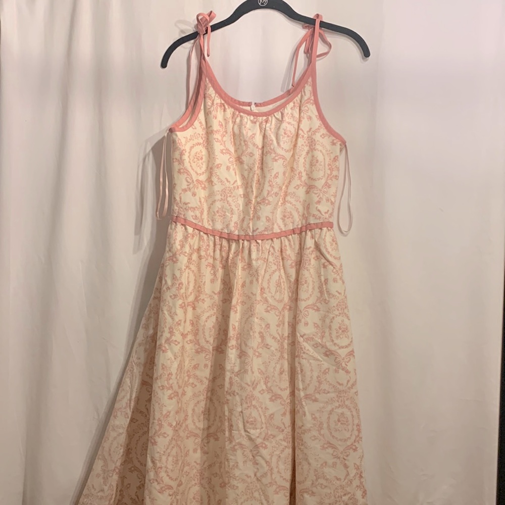Light cream and pink gal meets glam dress